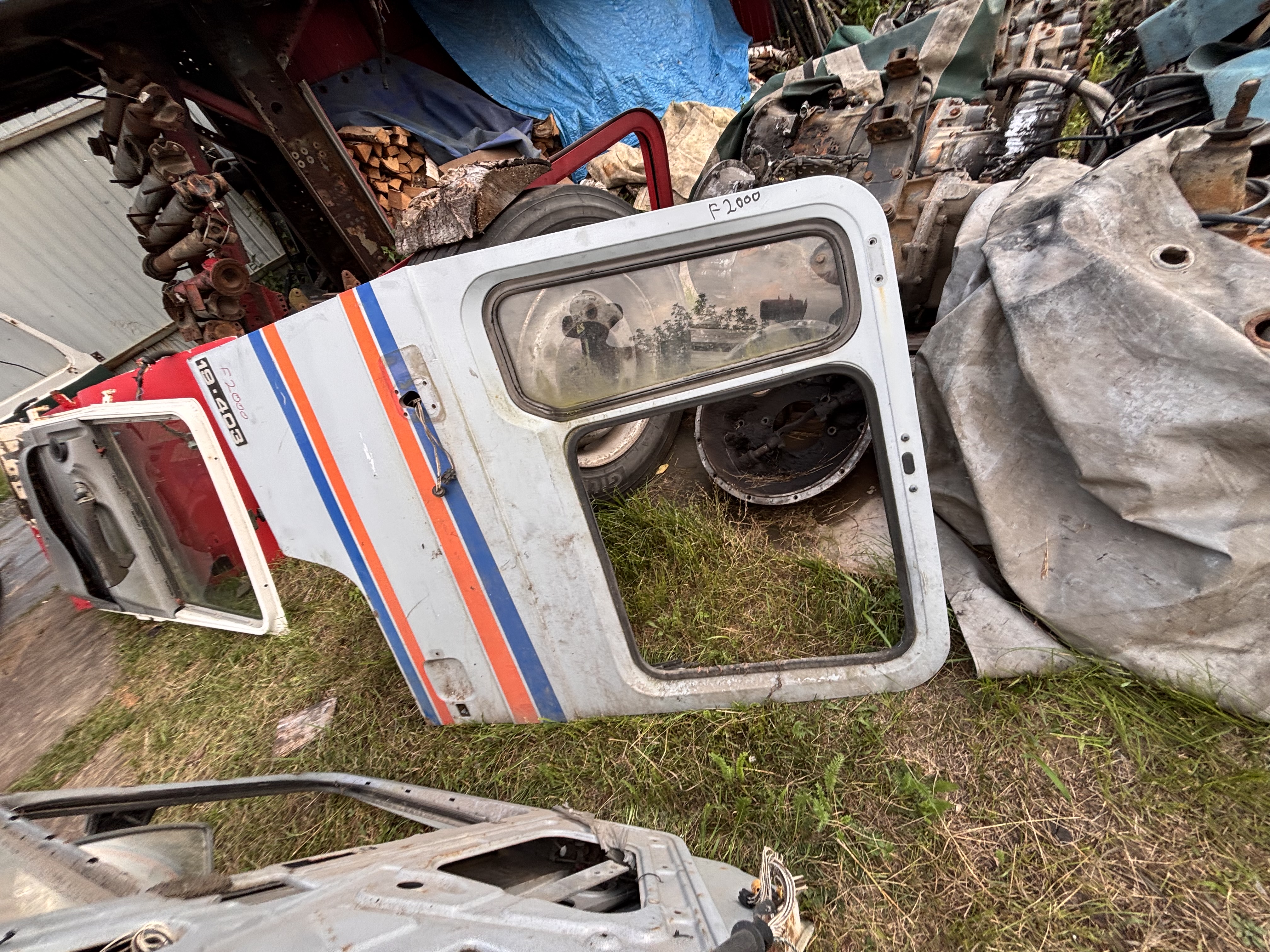 Двери левая и правая КОМПЛЕКТ Ман MAN F200 81626004077